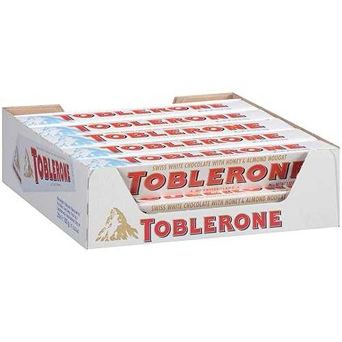 トブラローネ 白いこと 黒茶 砂糖菓子 赤ちょうちん、3.52 薬局衡オンス -- 1 容れものあたり近所 80 個。 Toblerone White Chocolate Candy Bar, 3.52 Ounce -- 80 per case.