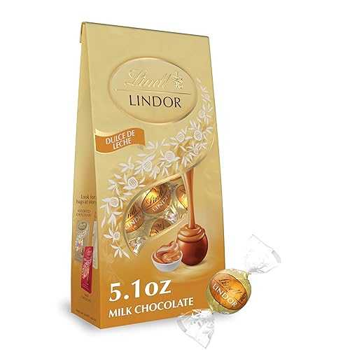 Lindt LINDOR Dulce de Leche Milk Chocolate Truffles, Milk Chocolate Candy with Smooth, Melting Truffle Center, Great for Gift Giving, 5.1 薬局衡オンス. Bag (6 Pack)