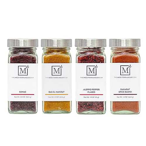 The Mediterranean Dish Exotic Middle Eastern Spice Bundle - Baharat, Ras El Hanout, Aleppo Pepper and Sumac - Gourmet Mediterranean Seasonings Set - Warm, Tangy and Aromatic Blends - Set of 4 Glass Bottles