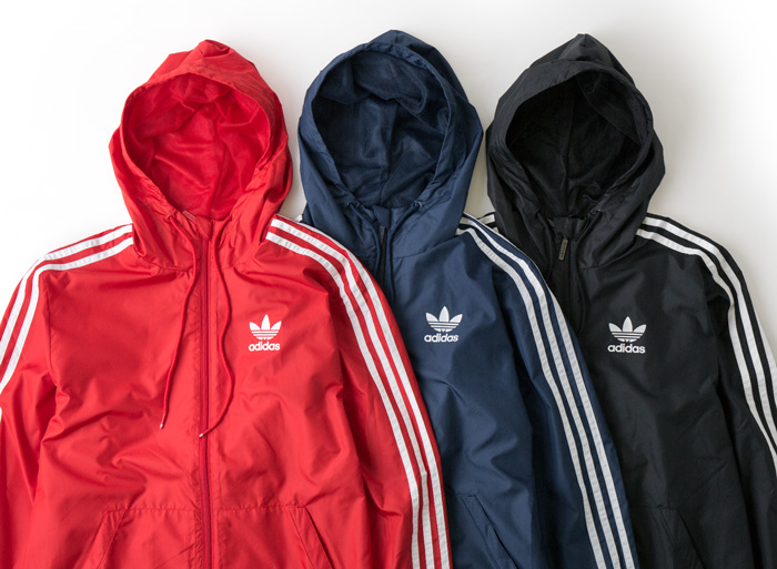 navy blue and red adidas jacket