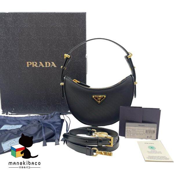 プラダ PRADA ブラック 新品同様 アーケ ミニ ワンショルダー 2way 黒 1BC194 ハンドバッグ ブランド コンパクト エレガント 高級感 おしゃれ フォーマル プレゼント ギフト ストラップ 箱 布袋 冊子 ランクS 女性用バッグ 【中古】｜manekibaco
