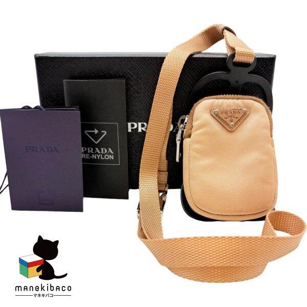 プラダ PRADA ベージュ スマホホルダー 1ZT016 ベージュ ポーチ付 箱 タグ 冊子 ランクA 小物 【中古】｜manekibaco 27,235円