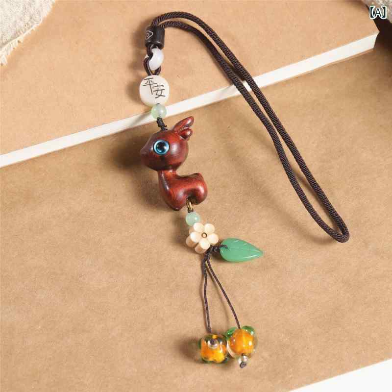 カーチャーム 紫檀 小鹿 バンビ 天然木製 ウッド レインボーウッド 白檀 車内装飾 道中安全 交通安全 万事順調 開運 縁起物 お守り ラッキーアイテム ペンダント ストラップ かわいい おしゃれ画像