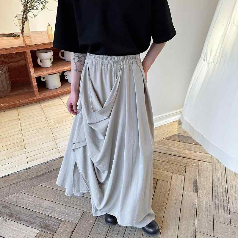 ワイドパンツ 男女兼用 ユニセックス アシンメトリー 変形デザイン レイヤード スカートパンツ ルーズシルエット フルレングス マキシ丈 モード ストリート カジュアル 春秋 ブラック カーキ ポリエステル素材 5,903円