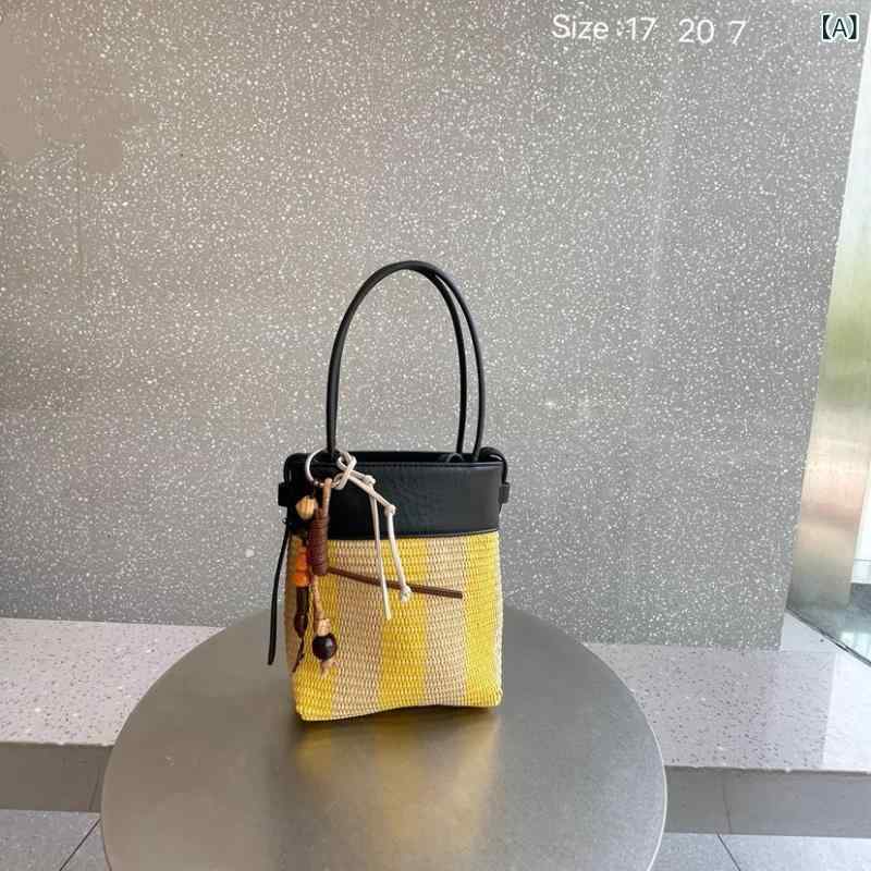 ショルダーバッグ レディース ラフィア 革 バケツバッグ バイカラー 編み込み 異素材 スマホショルダー 肩掛け 縦型 軽量設計 巾着型 ストライプ 素材 整理整頓 休日 お出かけ リゾート デイリー使い 手編み 裏地付き 丈夫 職人仕上げ