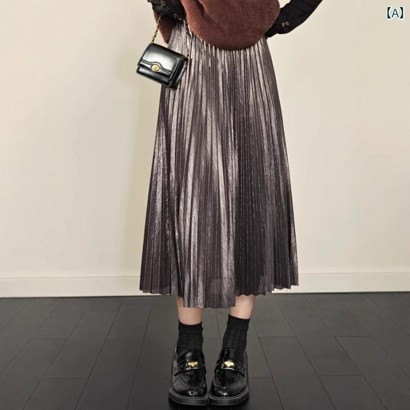 プリーツスカート ロングスカート レディース 光沢感のあるサテン調の生地が揺れる上品な仕上がり 縦ラインを強調する落ち感で美脚効果と体型カバーを両立 ウエストゴム仕様でストレスフリーな履き心地 オフィスやフォーマルなシーンでも活躍する着回し力の高さ一枚