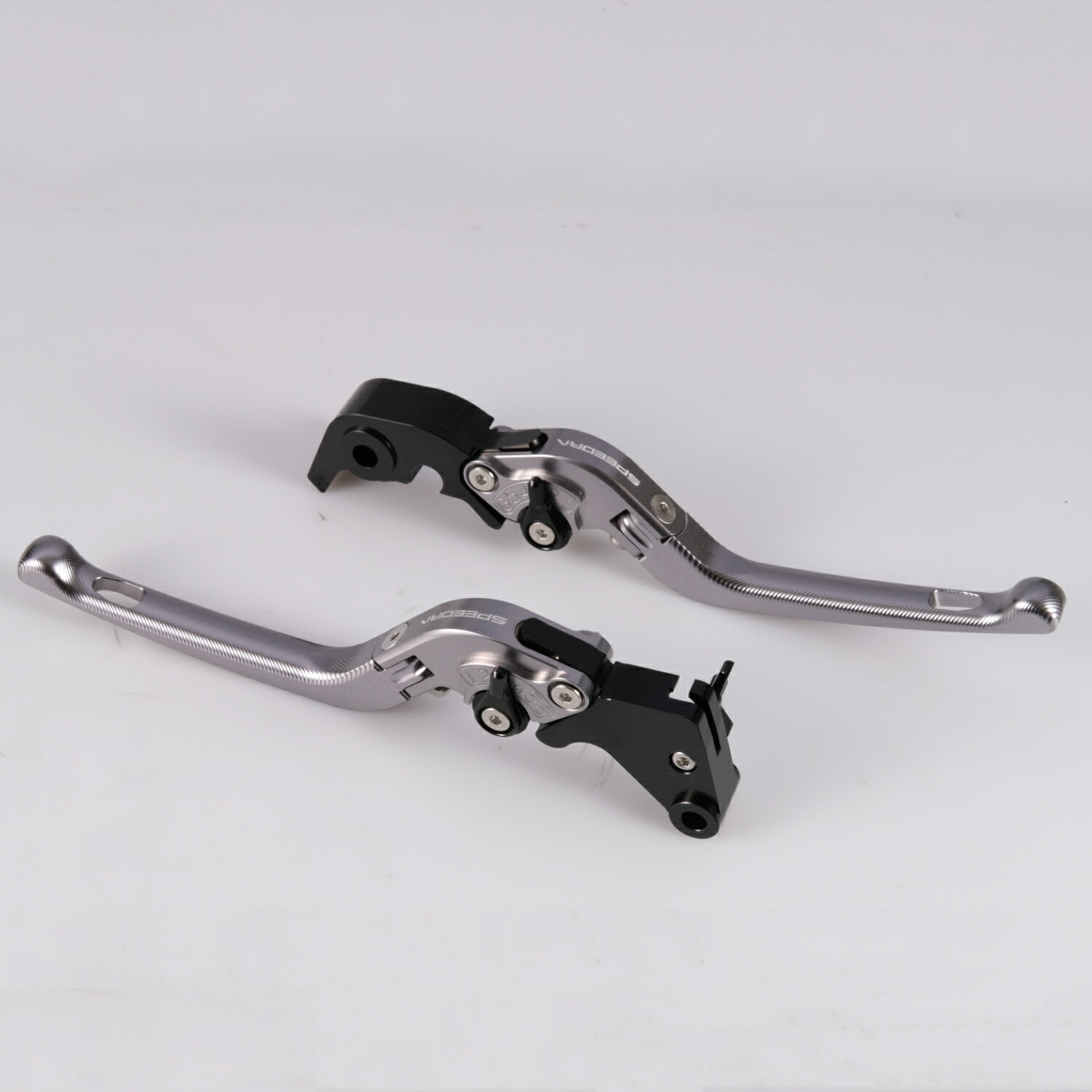 SPEEDRA スポーツスターS、ナイトスター、パンアメリカ用 可倒式・アジャスタブルレバーセット (チタン/ブラック)LVDGHD01TM-BK