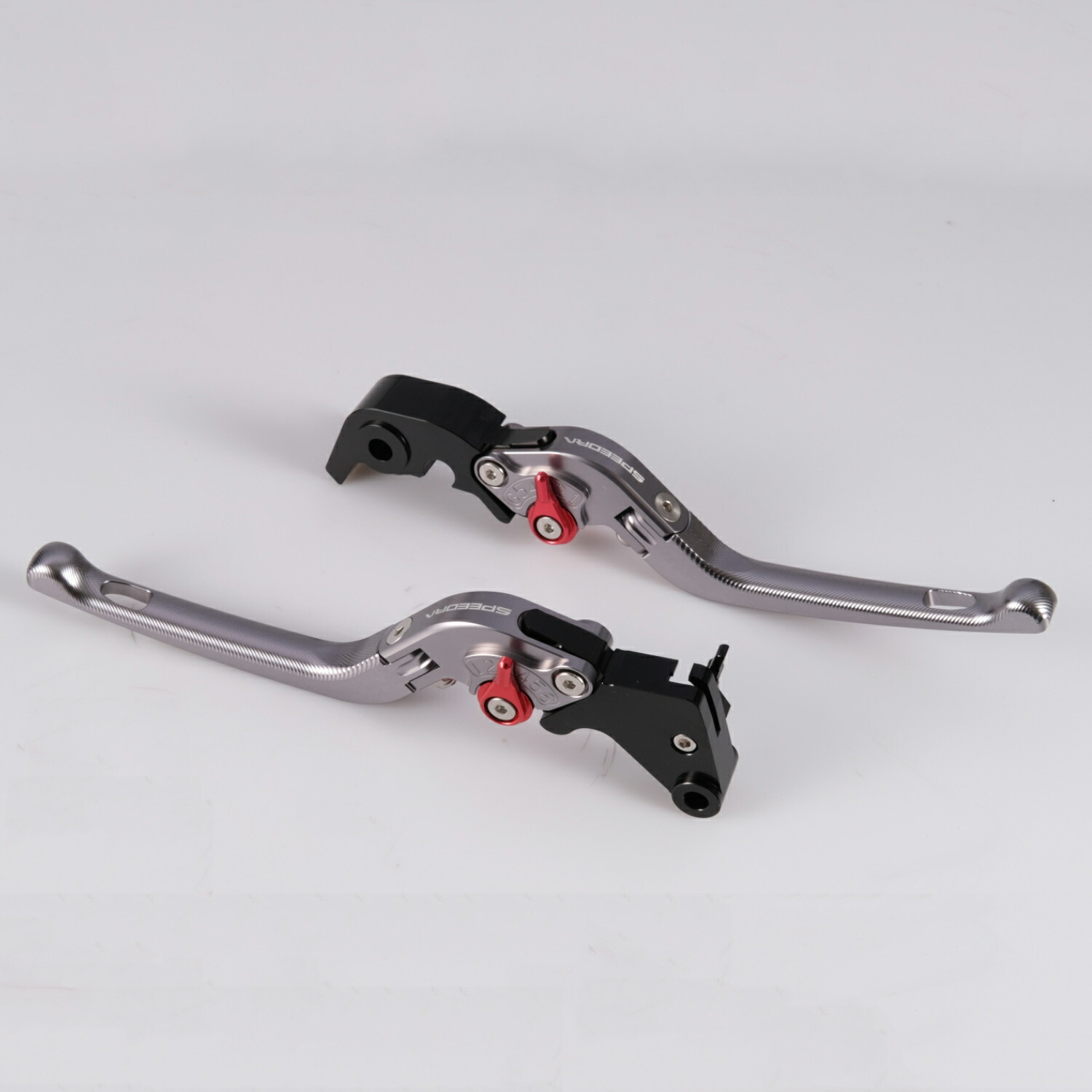 SPEEDRA スポーツスターS、ナイトスター、パンアメリカ用 可倒式・アジャスタブルレバーセット (チタン/レッド)LVDGHD01TM-RD