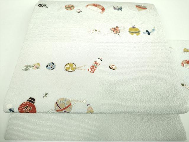 平和屋着物●九寸名古屋帯　玩具文様　鬼しぼ縮緬　金彩　正絹　逸品　未使用　DABB4825ps｜平和屋