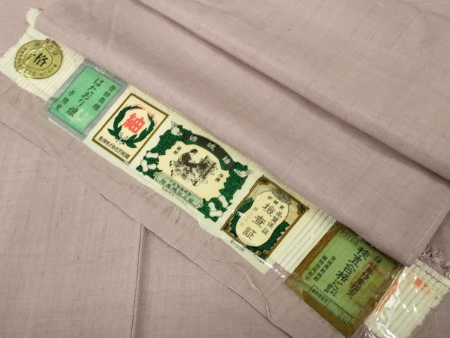 平和屋着物●極上　結城紬　奥順謹製　はたおり娘　手緒里　色無地　薄柿色　やまと誂製　証紙付き　逸品　未使用　DZAB5109kh6｜平和屋