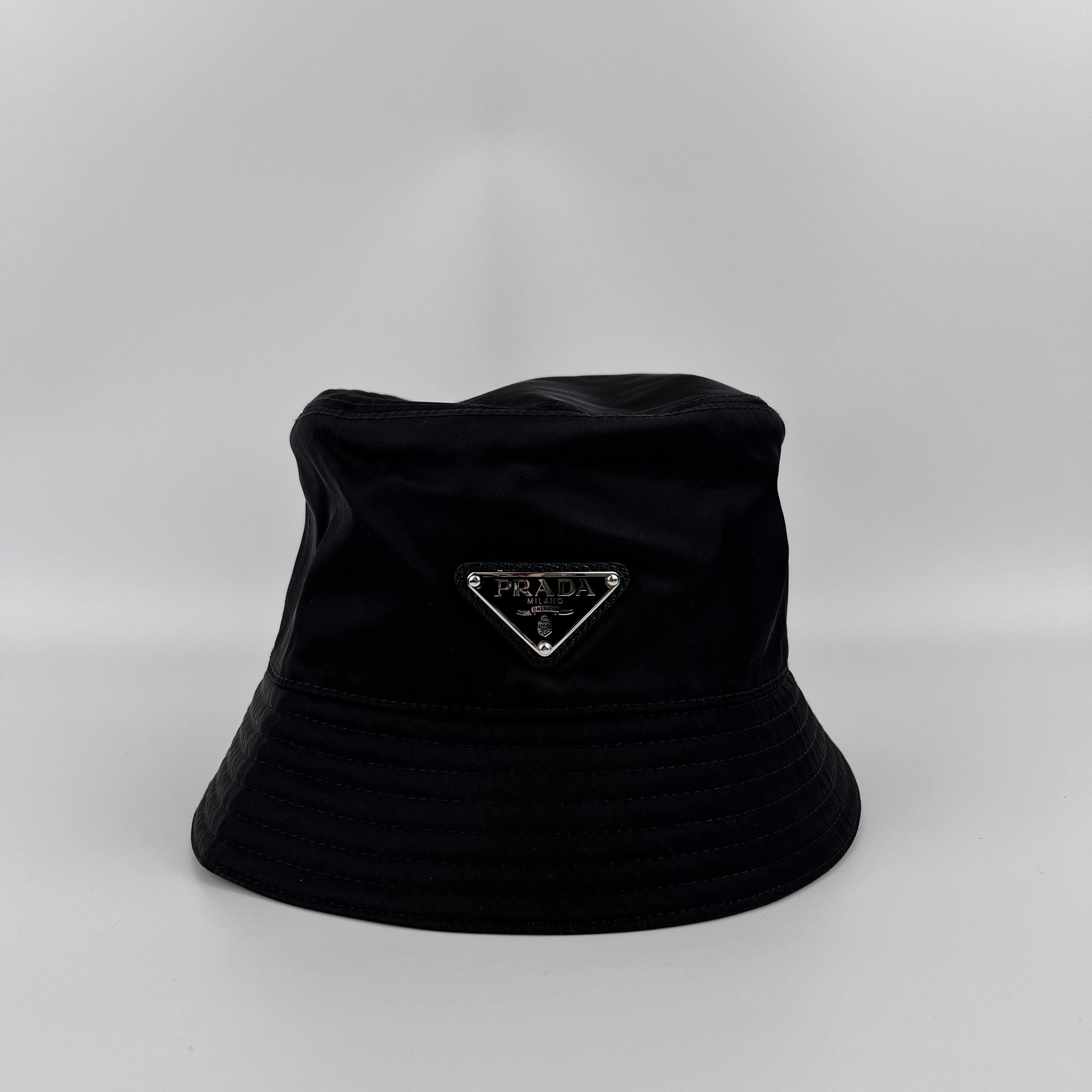 PRADA トライアングルロゴ ドリルハット S 帽子 バケットハット フリンジ Prada トライアングルロゴ バケットハット | ブルー | FARFETCH JP