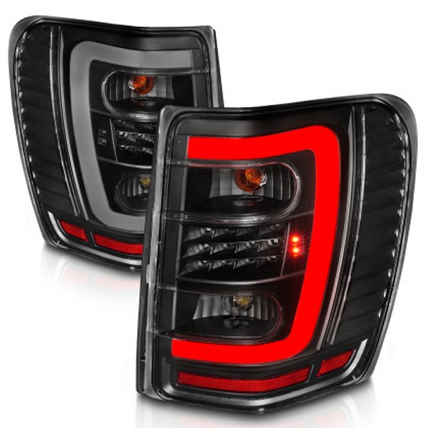 【USA在庫あり】 ANZO 1999-2004 Jeep Grand Cherokee LED Tail Lights w/ Light Bar ブラック Housing Clear Lens anz311394 JP店