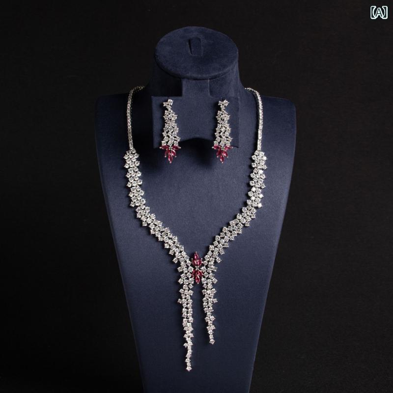 ネットで 話題の 花 柄 ジルコンネックレスイヤリング、 ダイヤモンドが ちりばめ られた 花 柄 ロング ペンダント、 絶妙で 個性 的な 甘い セット、 卸売