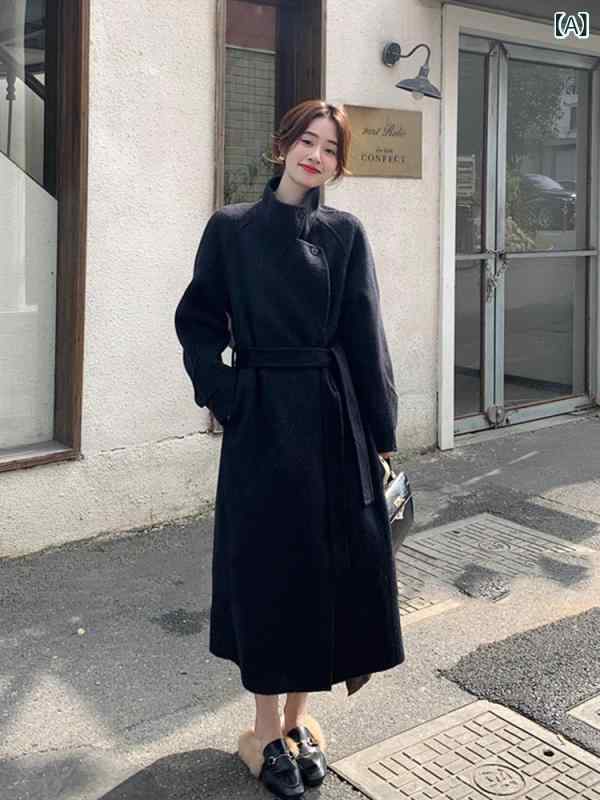 妃の 両面の カシミヤの コートの 女性の 秋冬の 気質の 中の 長い タイプの 結び目は ゆったり して いて 高級 感が あります。