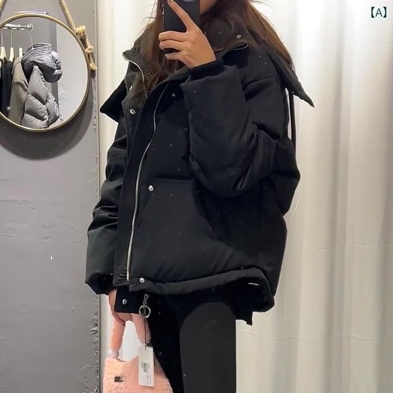冬の 服の 新型の 小さい 子の ダウン ジャケットの 女性の 90 白 鴨の 絨毯の 厚い ショート タイプの 帽子の ゆったり して いる 保温の カップルの コートの 潮