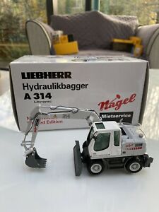 【送料無料】ホビー　模型車　車　レーシングカー モデルliebher 314 pelle modele negal