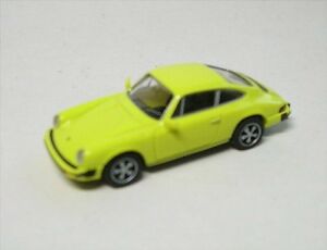 【送料無料】ホビー　模型車　車　レーシングカー ポルシェカットporsche 911 coupe jaune 1974