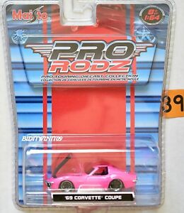 【送料無料】ホビー　模型車　車　レーシングカー スケールコルベットピンクカップmaisto pro rodz echelle 1 195m69 corvette coupe rose w
