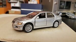 【送料無料】ホビー　模型車　車　レーシングカー オートランサーエボスカラmodellino auto saico mitsubishi lancer evo 7 scala 132
