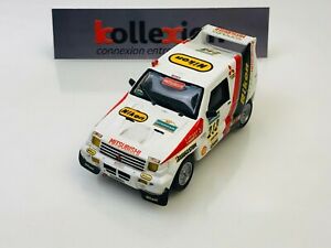 【送料無料】ホビー　模型車　車　レーシングカー パジェロニコンダカールjemmpy mitsubishi pajero n213 nikon p lartigue dakar 1988 143