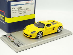 【送料無料】ホビー　模型車　車　レーシングカー ポルシェカレラカットイエローtecnomodel 143 porsche carrera gt coupe 2004 jaune 31,187円