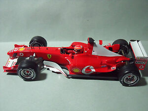 【送料無料】ホビー　模型車　車　レーシングカー フェラーリフォーミュラシューマッハマルボロマテルホットホイールferrari f 2003 formule 1 schumacher marlboro mattel hot wheels 118｜hokushin