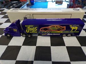【送料無料】ジミー・スペンサー＃スモーキンジョーののレースカートランスポーターホーラ：スケールのJimmy Spencer #23 Smokin' Joe's 1993 Race Car Transporter/Hauler 1:64 scale ERTL