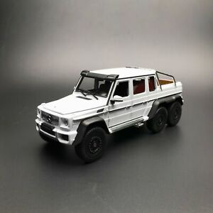 【送料無料】ホビー 模型車 モデルカー ベンツドアアンプボンネットモデルホワイト 124 welly mercedes benz g63 amg 6x6 door amp;bonnet open close car model white