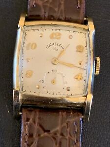 【送料無料】腕時計　ヴィンテージメンズロードエルギンカルタンクレアラグランニングvintage mens lord elgin 21j cal 556 14k gf tank rare lugs running