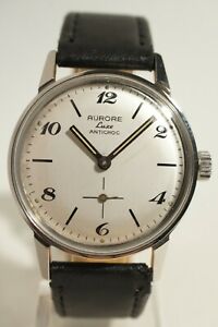 【送料無料】腕時計　モントレオーロレラックスメカニークアンアシエトルズボンエタットフォンピオンネmontre aurore luxe mecanique en acier, tres bon etat, fonctionne
