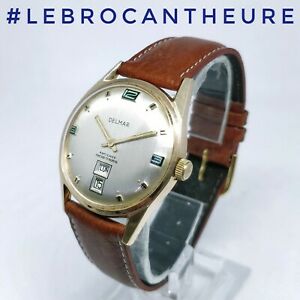 【送料無料】腕時計 デルマーデーデートモントルヴィンテージアンシエンヌキャリバーメカニクdelmar day date montre vintage ancienne calibre mecanique fe 233 67  circa 1965
