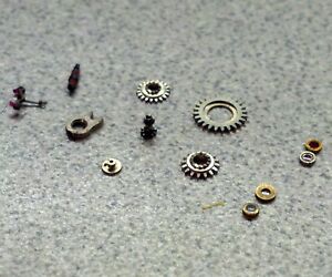 【貨物輸送無料】ウオッチ エルギンパーツパレットフォークキャップホールジュエルキャノンピニオンロットsmall lot of elgin 80 partspallet fork, cap amp; hole jewels, cannon pinion, etc