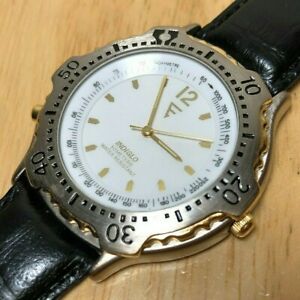 【送料無料】腕時計　vintage timex men 50m dual tone moving bezel analog quartz watch hour~ batter