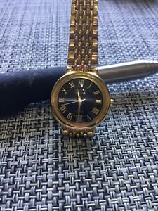 【送料無料】腕時計　キャシーアイルランドウィンドウゴールドトーンkathy ireland watch date window gold tone in good working condition as photo