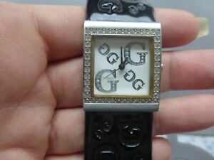 【送料無料】腕時計　モントレフェムゲスアベックストラスフォンピオンネトルビエンラージュールボンエタットmontre femme guess avec strass fonctionne tres bien largeur 2,6cm tres bon etat
