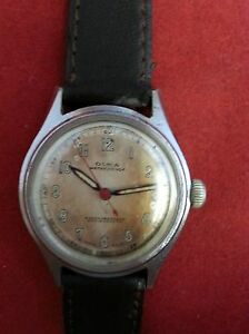 【送料無料】腕時計　ヴィンテージオルマスイスランストップvintage olma wrist watch swiss made 15 jewels antimagnetic runs amp; stops