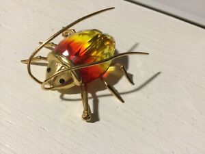 【送料無料】ジュエリー・アクセサリー ブローチメッキゴールドスワロフスキーsublime broche plaque or insecte veritable swarovski