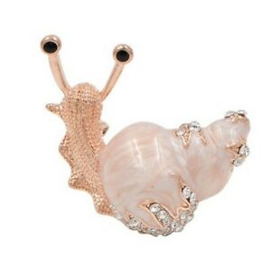 【送料無料】ジュエリー・アクセサリー スチールピンクカラーストラスクリスタルホワイトピンピンカタツムリbroche epingle escargot en acier couleur rose et strass cristal blanc