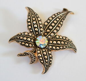 【送料無料】ジュエリー・アクセサリー ラインストーンブローチbroche feuille ancienne metal et strass｜hokushin
