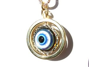 【貨物輸送無料】宝飾品・付属物 ステンレス鋼ギリシアstainless golden turning rotate double sided evil eye greek women men  pendant