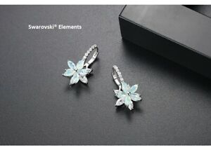 【送料無料】ジュエリー・アクセサリー イヤリングスワロフスキーエレメンツメッキホワイトゴールドboucles doreille fleur verte swarovski elements plaque or blanc top qualite