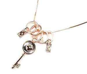 【送料無料】ジュエリー・アクセサリー ジャンパーネックレスペンダントリングクローバーキーcl1491e sautoir collier pendentif anneaux metal or rose avec cle trefle et