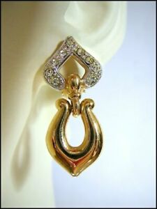 【送料無料】ジュエリー・アクセサリー ユニークイヤリングドールストラスクリップジュエリーファクスルunique boucle doreille dore strass clips facon joaillerie