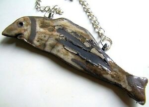【送料無料】ジュエリー・アクセサリー アルジチェーンsautoir poisson fretillant en ceramique cuisson raku marron noir sur chaine arge