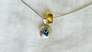 【送料無料】ジュエリー・アクセサリー バッドアイシルバーペンダントスターリングアンドアンバーmauvais oeil pendentif argent sterling et ambre 21,456円