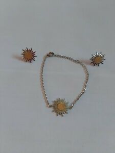 【送料無料】ジュエリー・アクセサリー シルバーゴールドスチールストラップサンイヤリングparure bracelet et boucle doreille soleil en acier argente et dore
