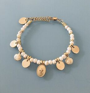 【送料無料】ジュエリー・アクセサリー ヘイシパールブレスレットクロスアイデアbracelet femme croix en perles blanches et perles heishi plaque or, idee cadeau