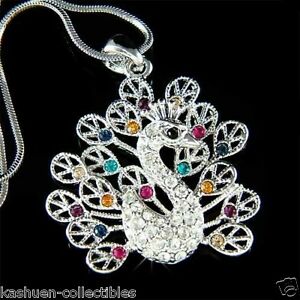 【送料無料】ジュエリー・アクセサリー クリスタルスワロフスキーピーコックフェザーネックレスジュエリーナインpaon avec cristal swarovski paonne plume collier bijoux neuf 21,158円