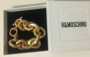 【送料無料】ジュエリー・アクセサリー モスキーノモスキーノブレスレットブレスレットゴールドメッキmoschino hamp;m h amp; moschino bracciale bracelet oro plated nuovo  in box