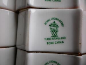 【貨物輸送無料】勝手もと装置・食器・膳立て物の具・瀬戸もの の書き割り、大身寄りの悧巧のヴィンテージ帯状髪飾り力くらべ瀬戸ものテーブルナプキン輪っかset of 9, vintage royal crown derby porcelain napkin rings for large family